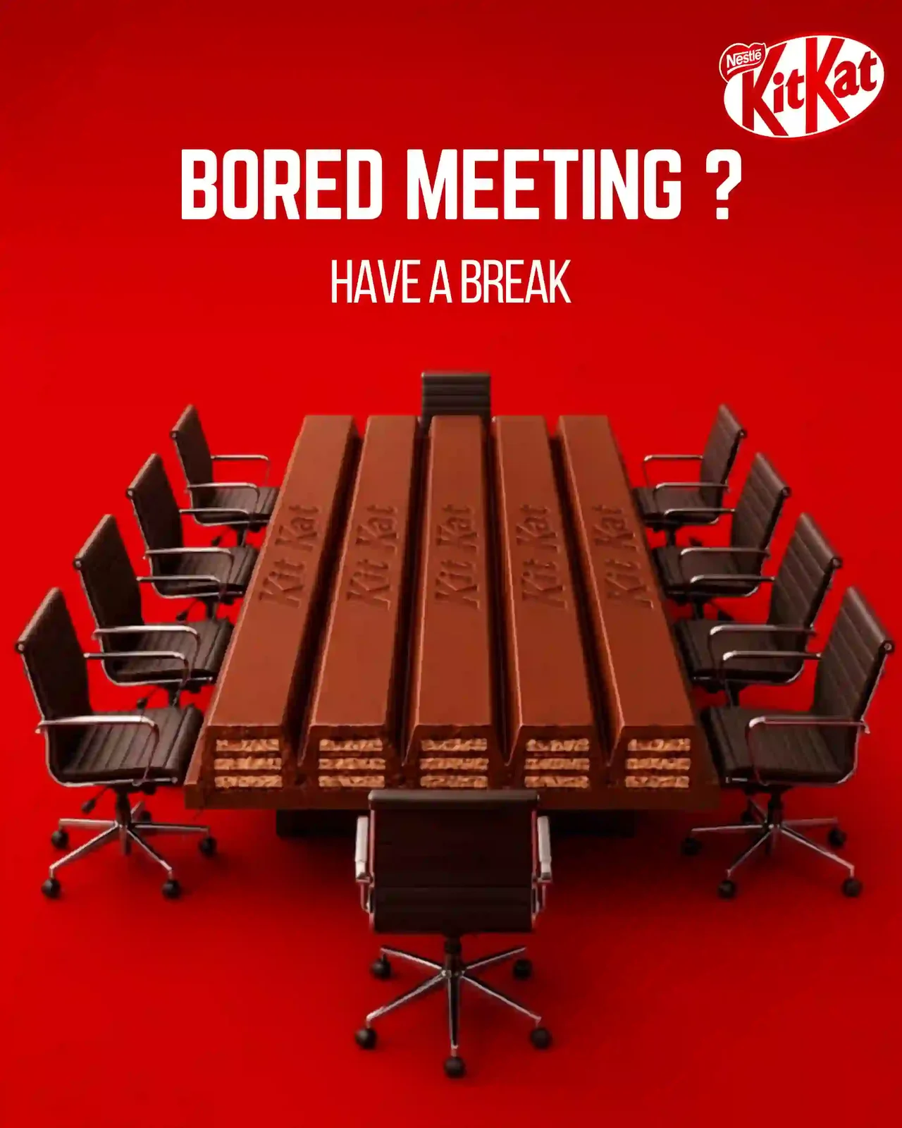 Creative ad concept: a boardroom table made of KitKat fingers with the headline Bored meeting? Have a break